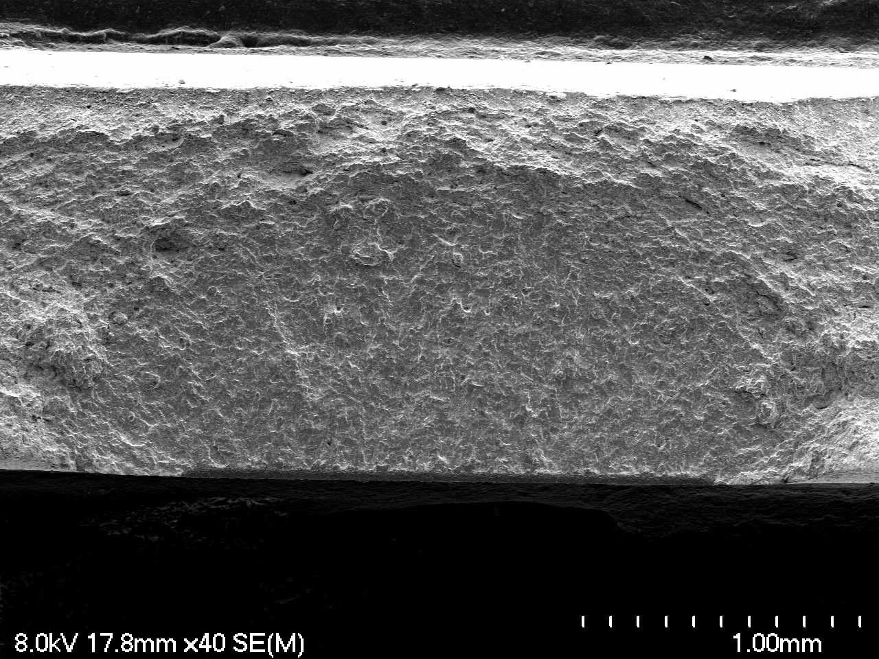 Measurement directions of the surface fatigue crack length and depth.