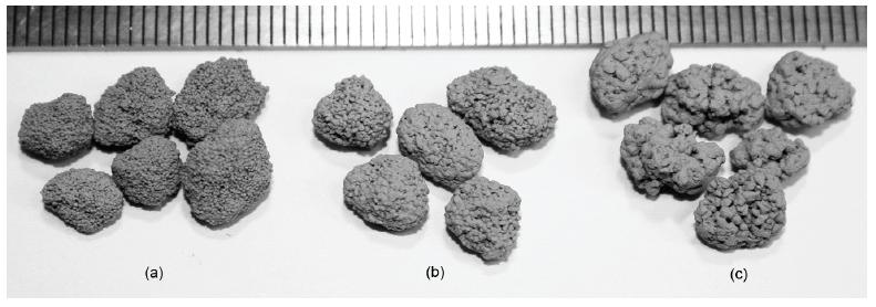 Photograph of MCC-A as size of primary agglomerate: size of primary agglomerate; (a) 212∼300㎛, (b) 300∼600㎛, (c) 600∼850㎛.