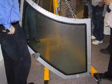 Damage done to windscreen of a plane that encountered ash.