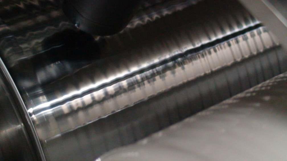 Ribbing instability occurring in forward roll coating process..