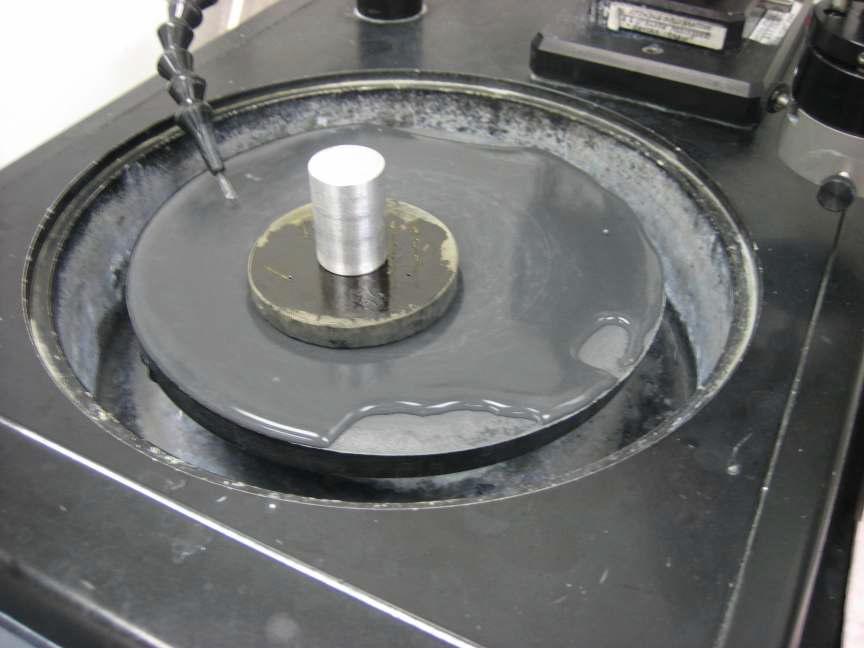 Polishing process for flat and tapered optical fibers