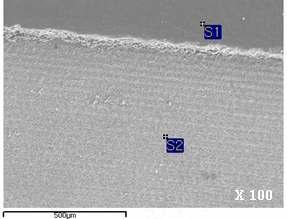 SEM micrograph of the epoxy coated Type 304 stainless steel specimen after applying Nd:YAG pulse laser