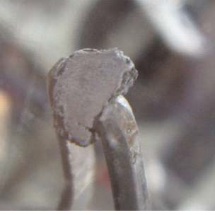 Fig. 3.1.6.26. Photograph of the cross-secton of a reduced uranium oxide pellet.