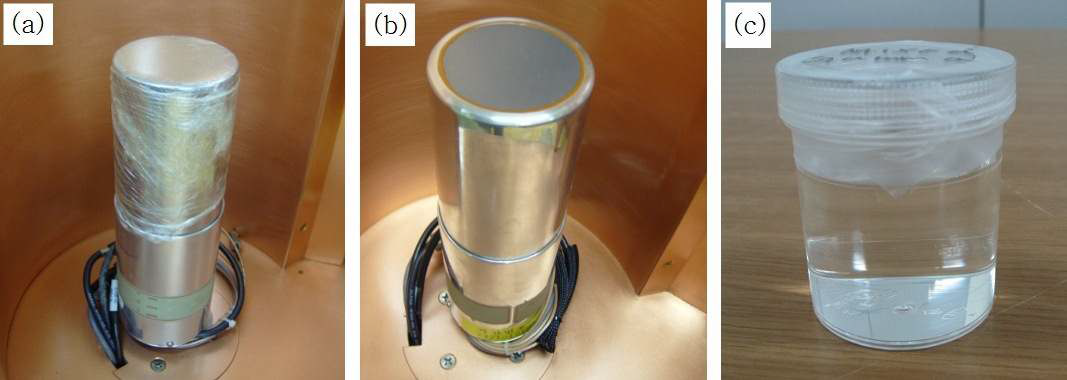 그림 143. P-type HPGe 검출기(a), N-type HPGe 검출기(b) 와 혼합감마선원이 충진된 U8 용기(c)