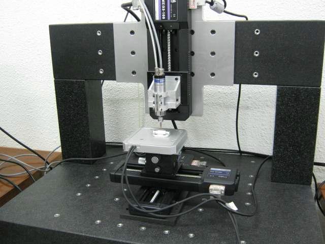 Photo of prototype of machining center using 2-D high frequency vibration