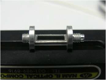 Seismic mass after bonding with reflective grating.