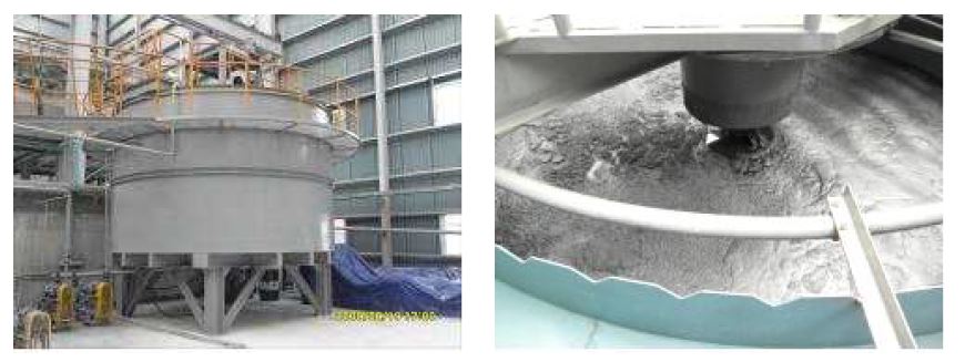 Photo of storage tank for molybdenite concentrate.