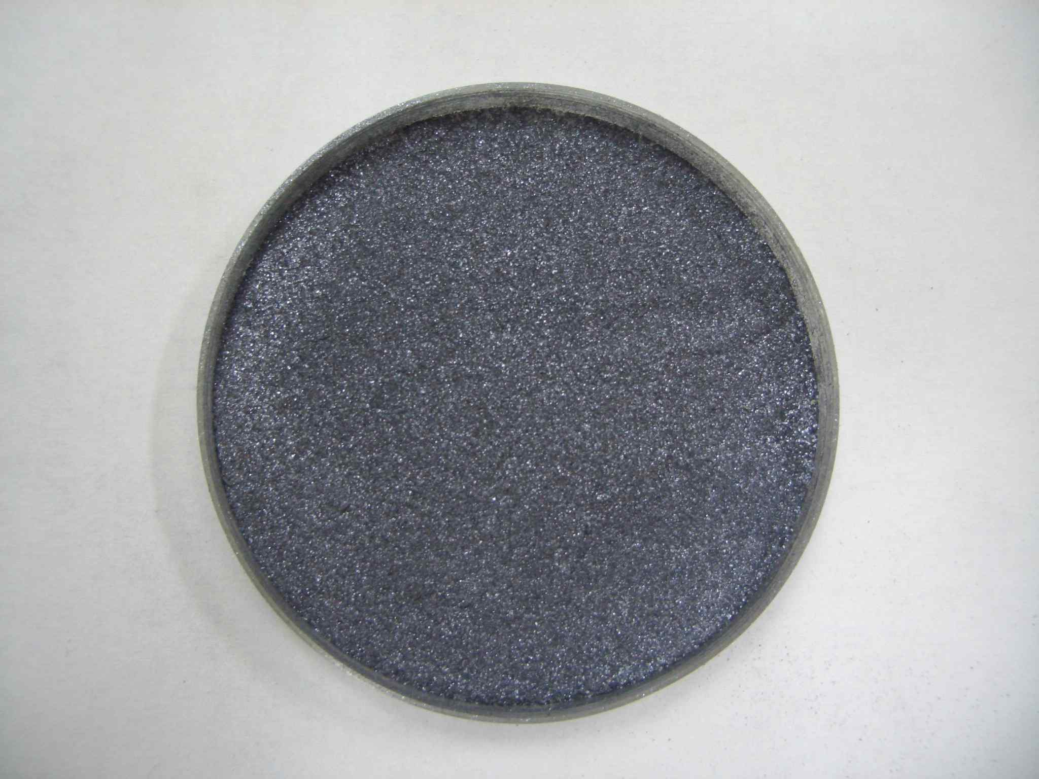 Photo of final molybdenite concentrate purified from Dong-Won NMC mine.