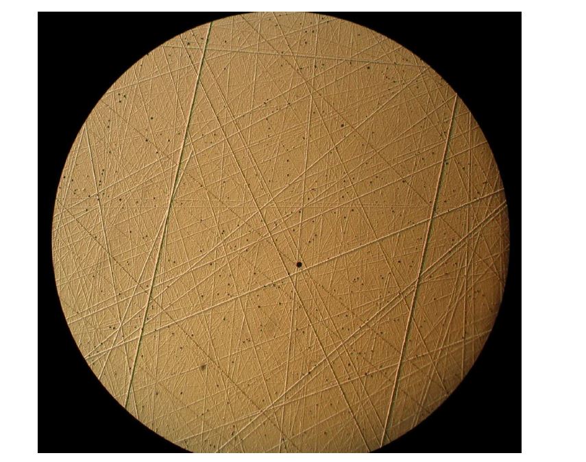 Fig. 3 Nomarski contrast image of SiC wafer (0001) Si face after KOH etching.