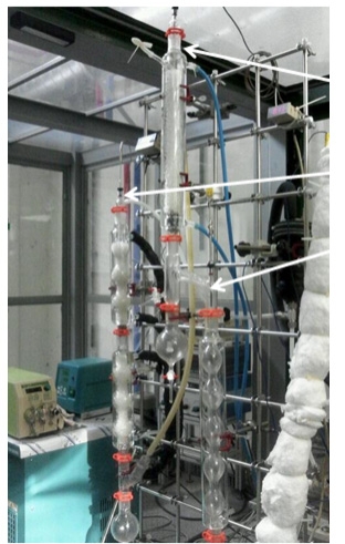 증류탑 형태의 유증기 응축 회수 시스템