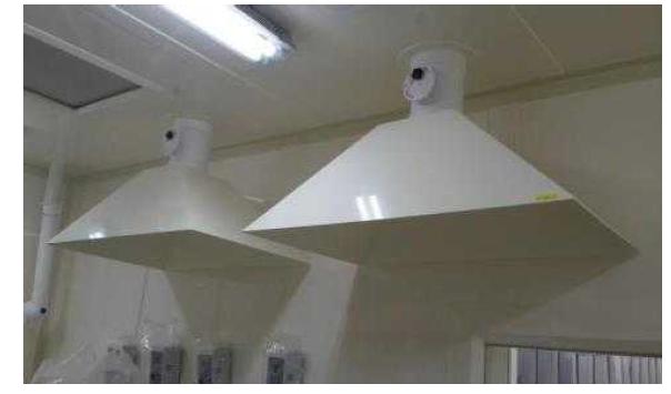 Exhaust hood over the acid vessels