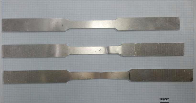 Aluminum 5052-H32 specimens: (top) before testing, (middle) after tension (no current density) and (bottom) after tension with periodic current density (110 A/mm2, 0.5 sec duration, 30 sec period)