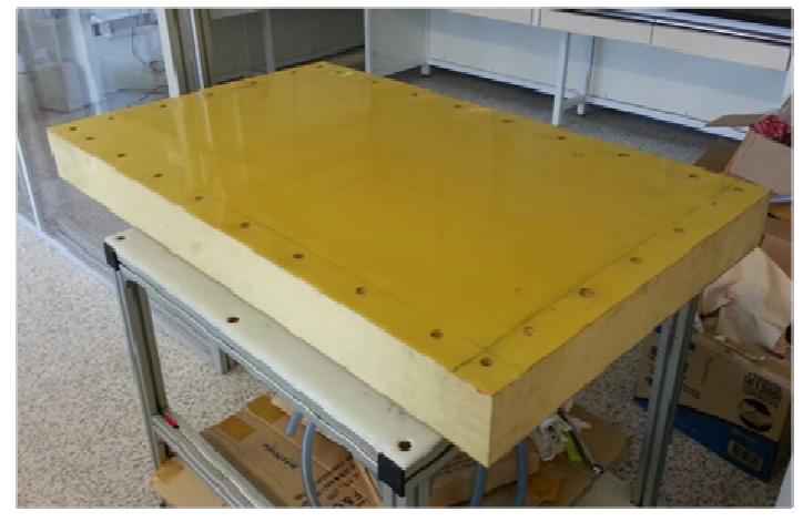 Photograph of the fabricated sandwich end plate structure for VRFB stack.