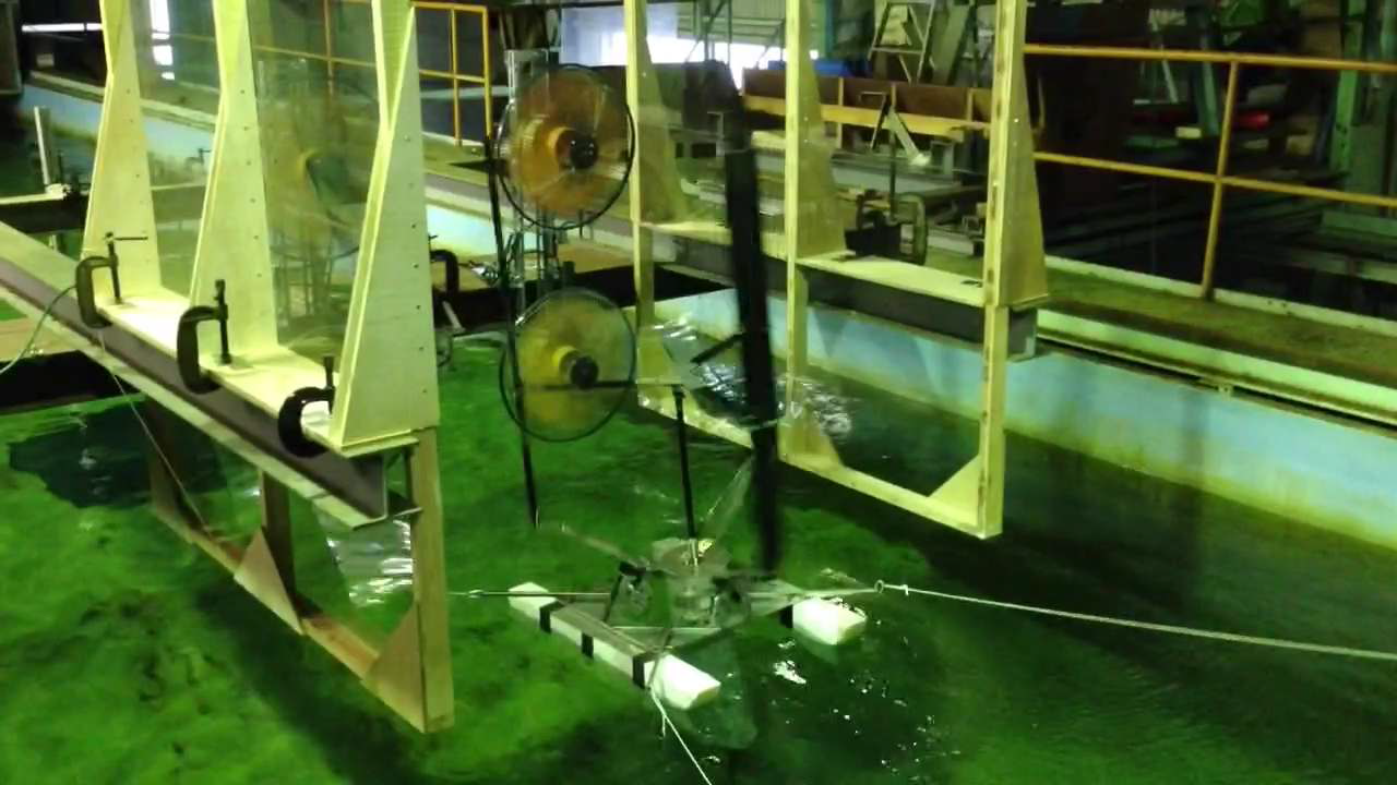 Snapshot of the water tank experiment; wave length 1000mm, wave height 30mm, URL to the movie http://youtu.be/2vGSl80O_Ek