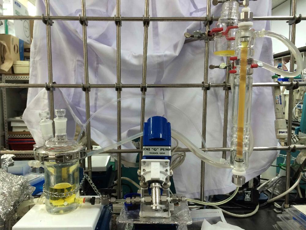 Packed bed reactor used for acidolysis reaction of PC with DHA