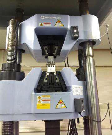 Example of tensile testing machine attached the sample