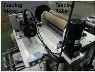 챔버 위에 설치된 Feeding 모터와 롤러
