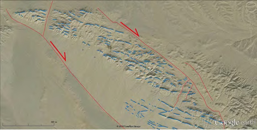 Lineament and fault developed in the surveyed area, Omnogobi, Mongolia (image from Google). WNW trending lineaments are developed within two NW trending faults. WNW trending lineaments are revealed as dykes, faults and alteration zones.Main Cu-mineralized area is located in the central part of the surveyed area.