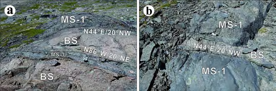 (a) Interbedded MS and BS of the study area. The contact strike WNW or NE and dips 20° to the N. (b) NE-striking planar BS body within a MS body.