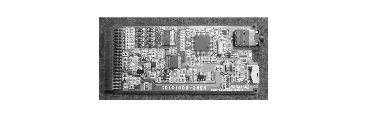 Optical transmission module assembled on printed circuit board (PCB) with a size of 100 mm × 45 mm.