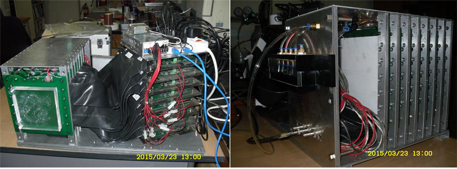 8겹 PPIC 단위검출기와 2048 채널 신호처리 전자장치로 구성된 본 연구의 최종 입자선 치료빔 선량측정장치를 접사한 사진.