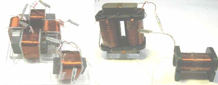 Photographs of assemblies of cores and coils which form square and rectangular type reactors, respectively