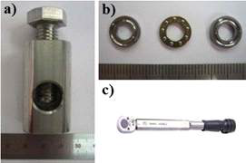 a)접합 장치; b)베어링; c)토크렌치