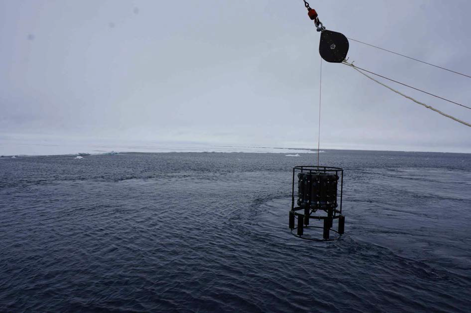 A picture showing the sampling of metal free seawater using Go-FLO rosette system for iron assimilation experiment