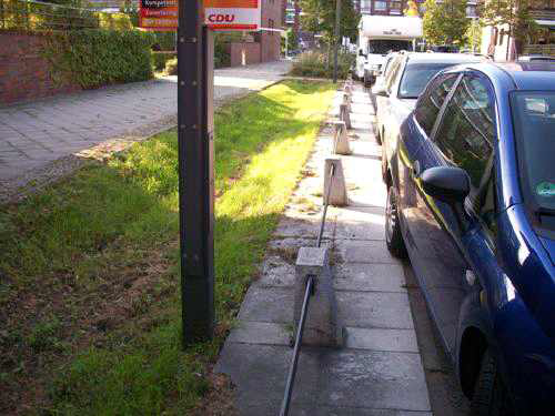 Roadside Swale - Flush Kerbing and Low Barrier Keeping Vehicles out of Swale