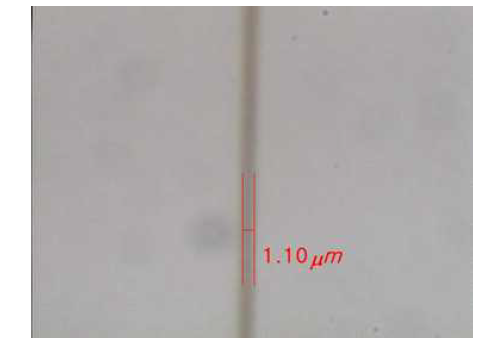 내경 5um 유리 캐필러리를 이용한 1um 선폭의 연속선 인쇄