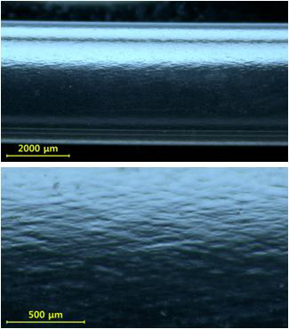 Die 방향 공기분사에 의한 튜브[A] 표면에 형성된 미세돌기 모습