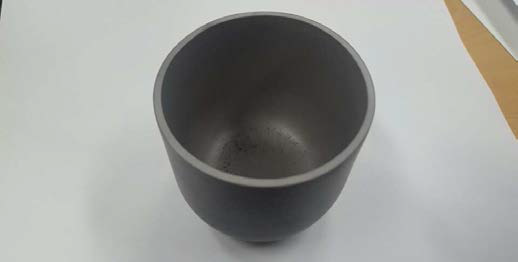 Alumina crucible which turned back after the high-temperature vacuum carburizing experiment.