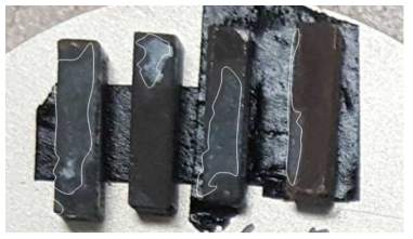 Photographs of the surfaces of Ti and polymers after debonding test. The Ti surfaces were etched for 8 min at 80 ℃ in 30% sulfuric acid.