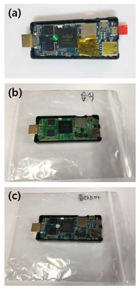 (a) 페릴렌 코팅 전 dongle, (b) 실란처리 후 페릴렌 코팅 dongle, (c) 플라즈마 처리 후 페릴렌 코팅 dongle