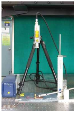 Photo of Laser with a tripod for a detector.