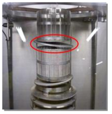 Photograph of crucible system with liquid salt guide disk.