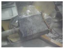 Reduced UO2 sample after removing stainless steel mesh in cathode basket after the 1st run.