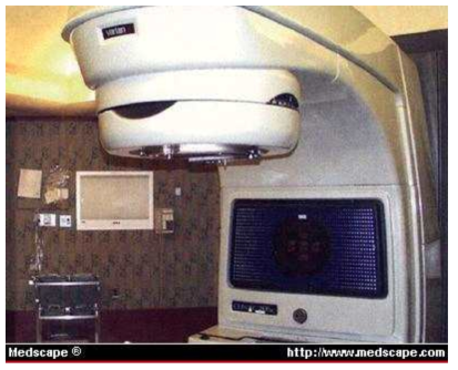 The Varian linear accelerator is linked to an inverse treatment planning station, and the circular collimator is mounted on the treatment gantry for IMRT.