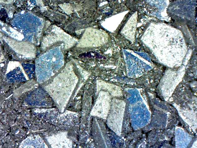 Pin mill로 분쇄한 태양전지 폐셀의 현미경 사진