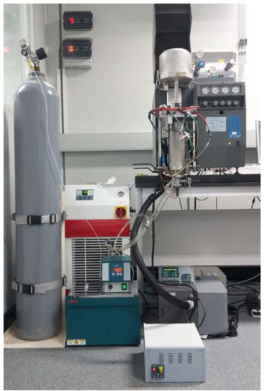 Photograph of high temperature TGA device for measurement of hydrogen generation resistance characteristic
