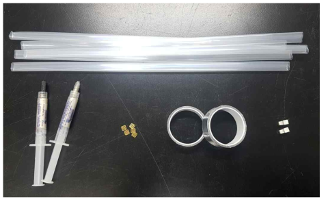 사용한 polyethylene terephthalate(PET) 열수축포, 2액성 전도성 접착제, CuBe 전극, 알루미늄 테이프, 알루미늄 틀