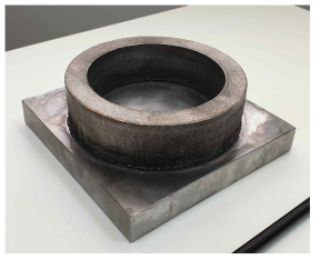 3D printed FGM mock-up as a third sized joint between pressurizer and surge line