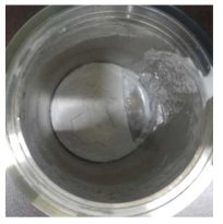 A photo of products from a mineralization reaction at zero stirring rate (CO2 pressure: 50 bar, S/L ratio: 0.05)