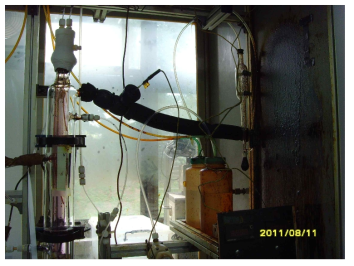 Photograph of Bunsen product discharge from the reactor