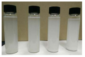 Photographs of microbrillar cellulose dispersions in NaOH/urethane aqueous solutions at concentrations of 3, 6, 9 and 12 g/L