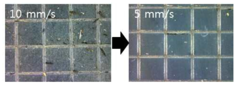 절단 속도 10 mm/s와 절단 속도 5mm/s 로 WL 조성의 소결체를 절단한 후 tape에 붙어있는 chipping 잔여물 사진