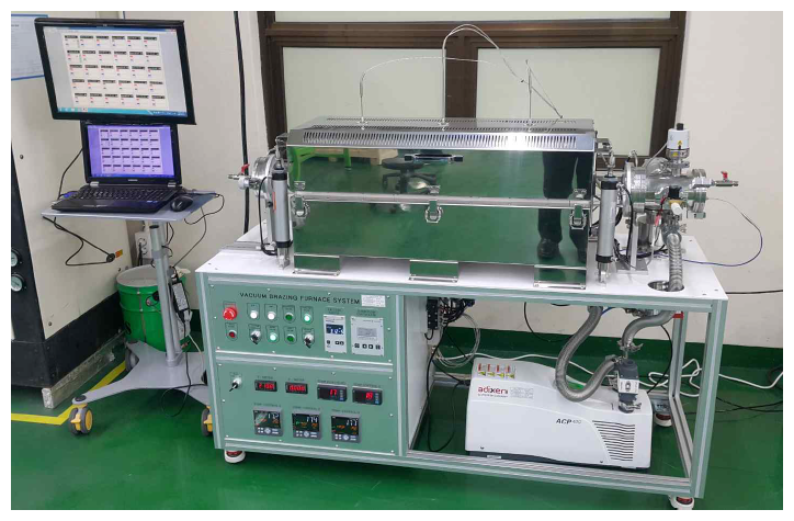 Rapid cooling high vacuum brazing system