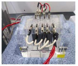 Electrochemical cell equipped with RuO2/Ti anode and TiO2 nanotube cathode